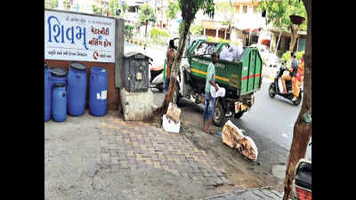 PPE kit disposed of with garbage in Ahmedabad