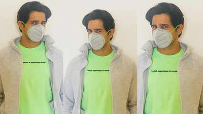 Sidharth Malhotra rocks ‘new normal’ look in green and grey face mask with matching attire, fan writes ‘go corona come back sid’