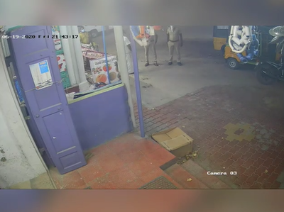 The footage shows police approaching the shop