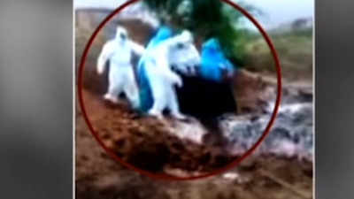 Shocking! Karnataka health workers throw body of covid patient into pit in Ballari