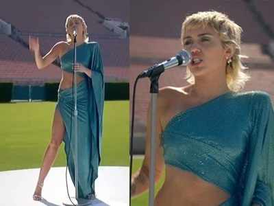 Miley Cyrus bares abs in Beatles-inspired dress for Global Citizen performance