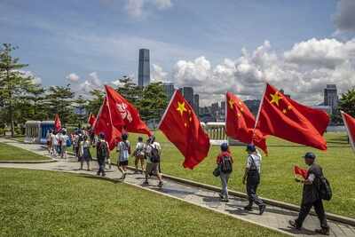 Xi clears Hong Kong law with sweeping powers; UK, Japan voice concern; US halts defence & tech exports