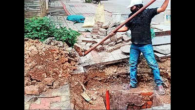 Cement bags, garbage choke Mangaldas Road drainage system