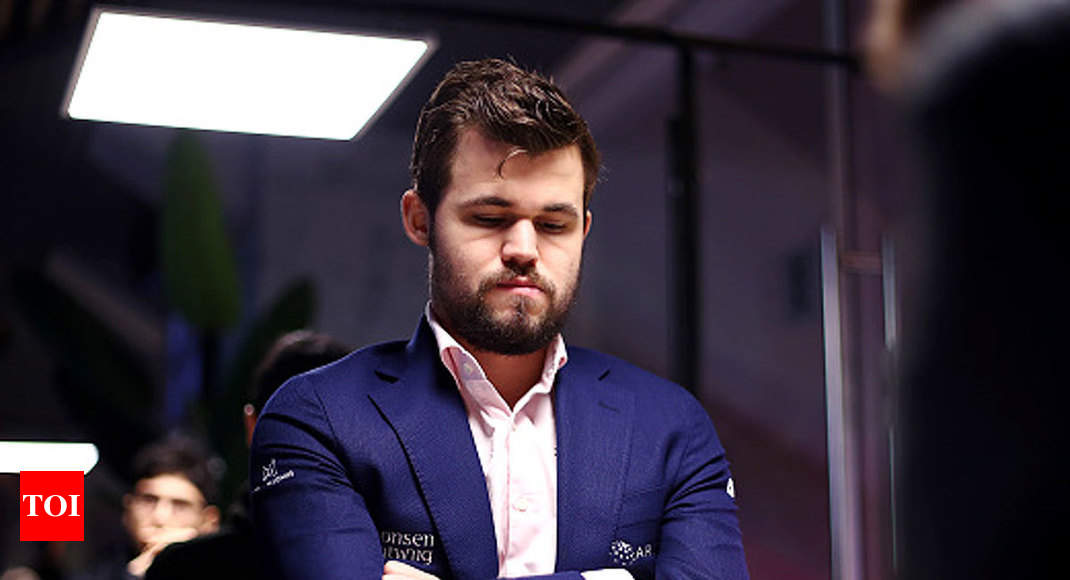 Carlsen edges into lead against Anish