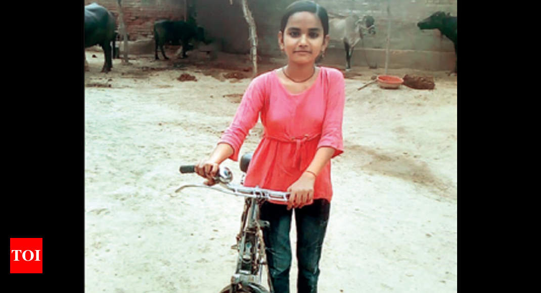 Madhya Pradesh: Village girl who cycles 24km to school & back gets 98.5% |  Bhopal News - Times of India
