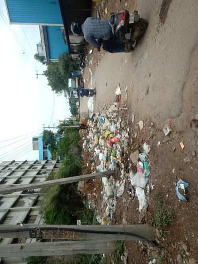 garbage all over Road in Gandhinagar-Nandanagar
