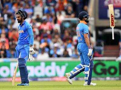 File photo of a dejected KL Rahul, left, and captain Virat Kohli during India's semifinal against New Zealand in the 2019 ICC World Cup in England (Photo by Nathan Stirk/Getty Images)