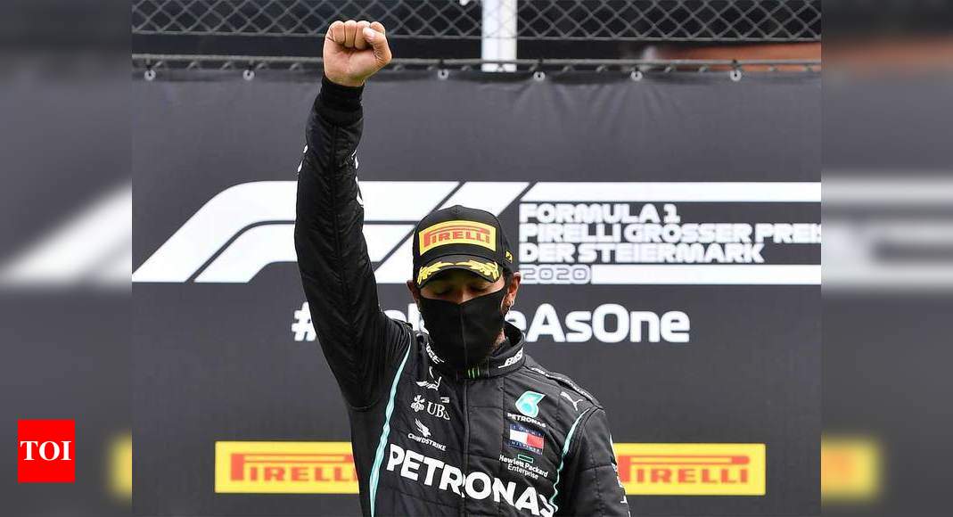 F1 Star Hamilton Raises Right Fist In Fight Against Racism | Racing ...