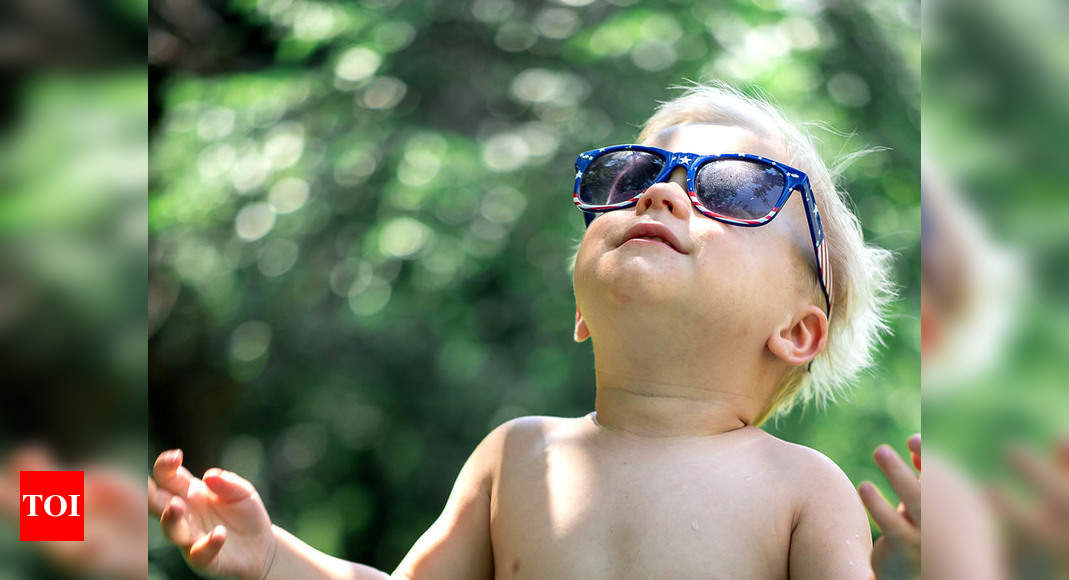 Baby Boy Wearing Sunglasses Portrait High-Res Stock Photo - Getty Images