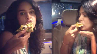 Watch: Mallika Sherawat turns her car into a cafe amidst the lockdown, binges on vegan pizza with her girls
