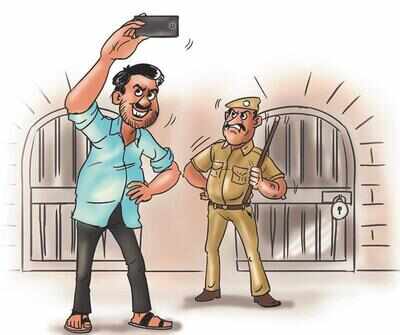 Released, man clicks selfies outside jail; jailed anew | Surat News - Times of India Released, man clicks selfies outside jail; jailed anew | Surat News - Times of India