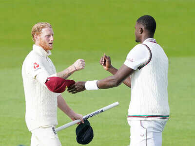 Ben Stokes and Jason Holder after the second Test at Old Trafford in Manchester. (AP Photo)