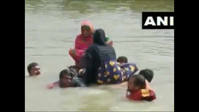 Pregnant woman taken to hospital on makeshift boat in Bihar's flooded Darbhanga