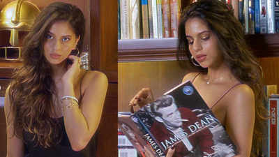Suhana Khan looks bewitching in this black outfit and glittery makeup as she poses in her home library