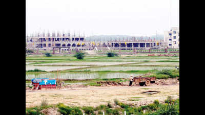 Greater Noida starts buying land from farmers