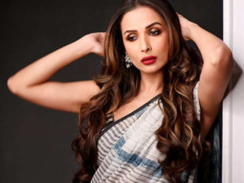 Malaika Arora just revealed the secret oil mix she uses on her lustrous hair!  | The Times of India