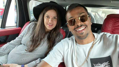 Hardik Pandya and mommy-to-be Natasa Stankovic pose for a happy selfie flashing their cheerful smiles!