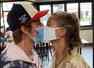 Video: Justin and Hailey share a mask kiss