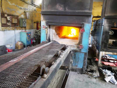 The giant aluminum chimney will release smoke emanating after cremating Covid-19 bodies wrapped in plastic, after purifying it using special filters much above residential localities (File photo)