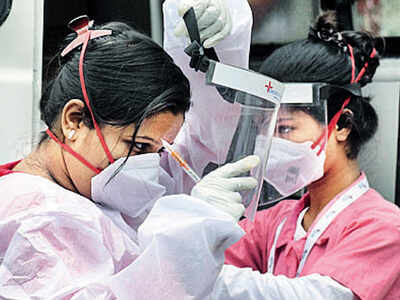 BMC staff screening a Dadar resident