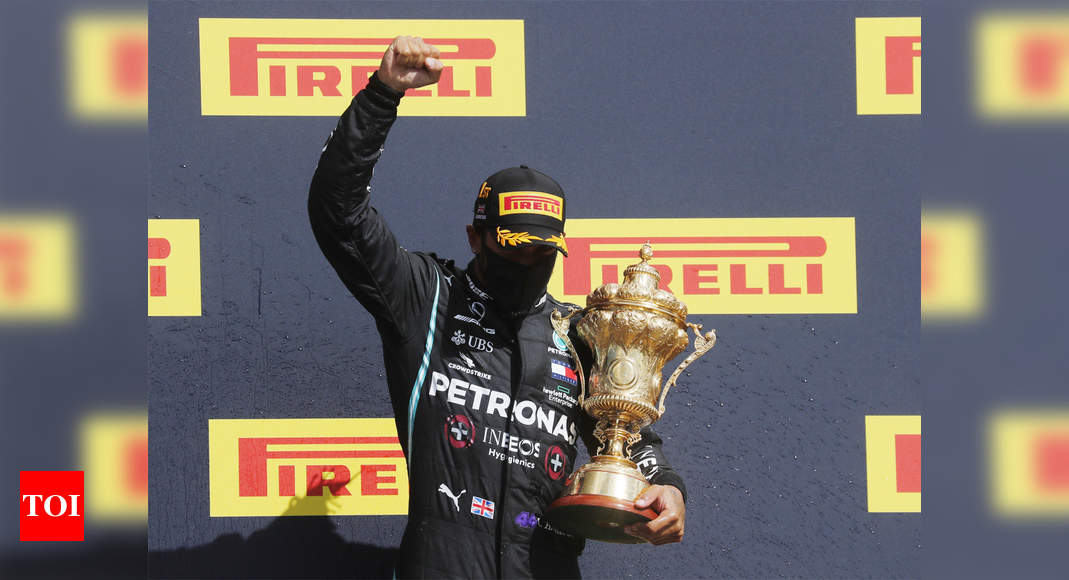 Why Did Lewis Hamilton Get Two Trophies After Winning the British Grand Prix?  - EssentiallySports