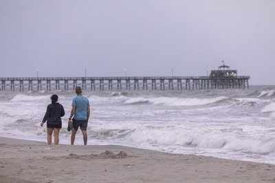 Shops closed, beaches deserted as hurricane Isaias nears the Carolinas