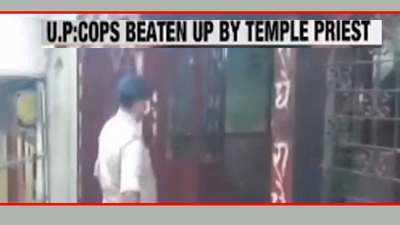 Shocking: Cops attacked by temple priest in UP's Mirzapur