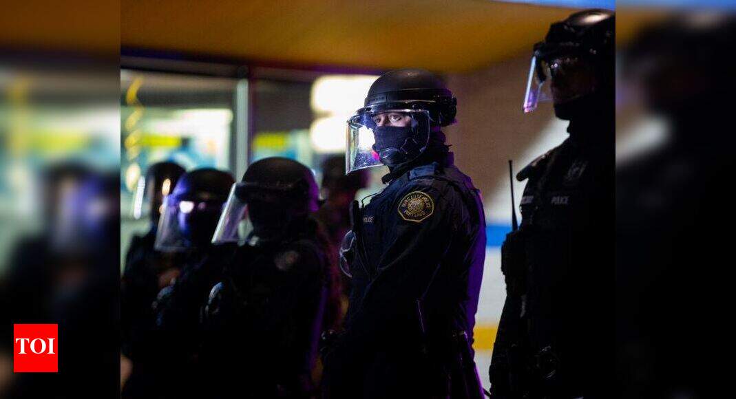 Riot declared as fire burns in Portland police union offices - Times of ...