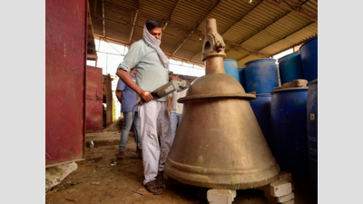 UP's Hindu, Muslim artisans cast 2.1-tonne brass bell for Ram temple