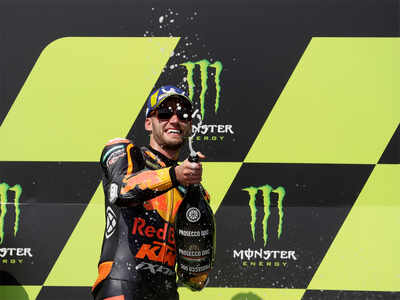Red Bull KTM Factory Racing's Brad Binder celebrates winning MotoGP race on the podium. (Reuters Photo)