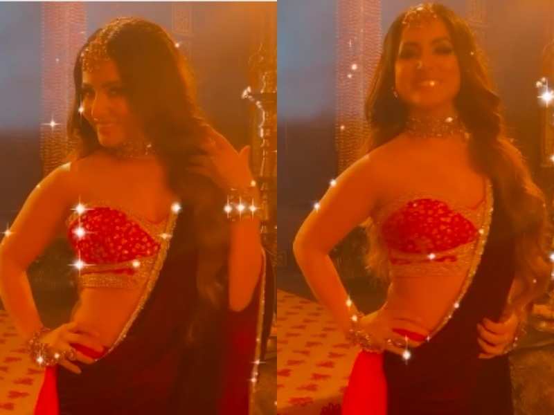 Naagin' Hina Khan sparkles in a red glittery blouse and skirt; flaunts her new look