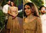This bride wore a dull gold lehenga with corset for her wedding reception