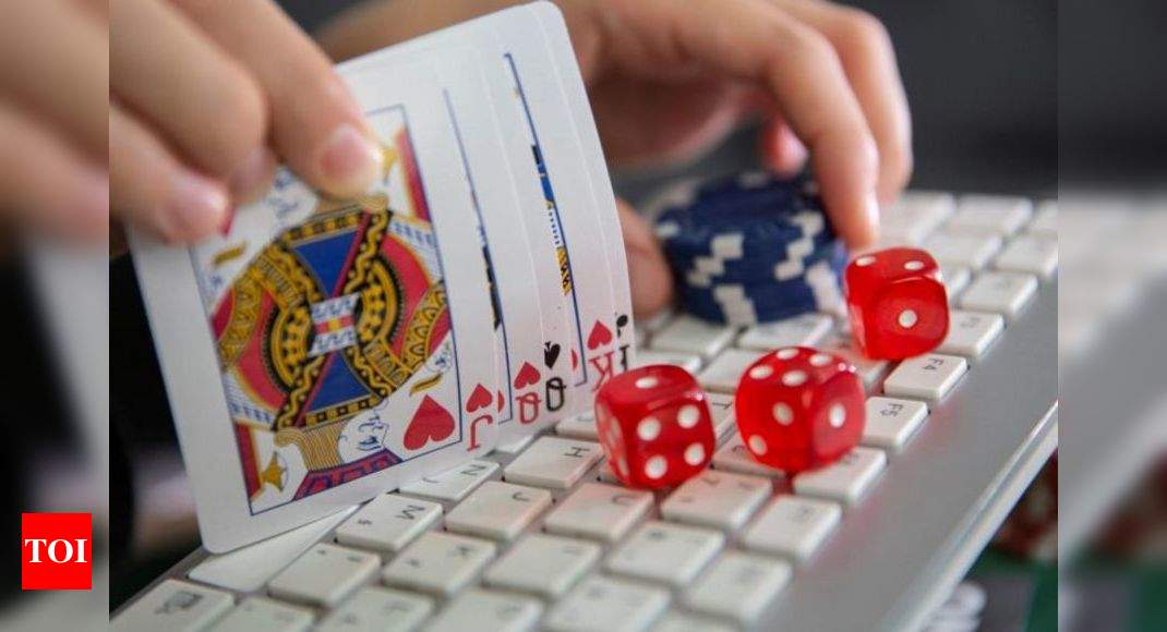 Chinese national among 4 held for Rs 1,100cr online gambling racket - Times of India