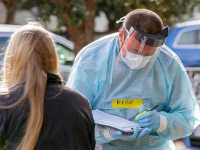 New Zealand probing for outbreak source, may expand lockdown