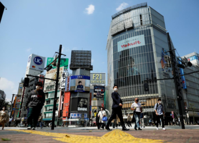 Japan's economy shrinks at record rate, slammed by pandemic