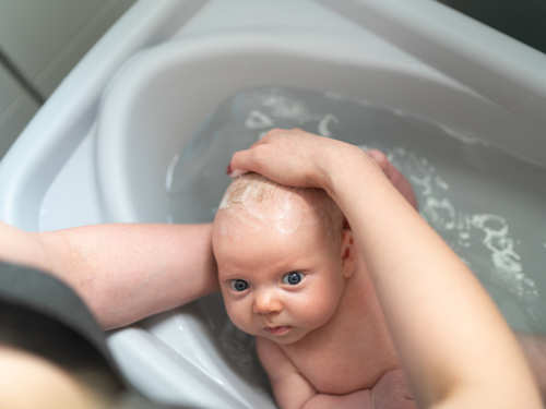 While Bathing Your Newborn, How To Keep Baby Sitting In Bathtub