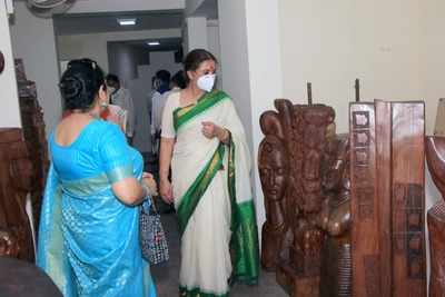 Wooden statues on exhibit at Chandigarh sculpture park