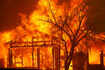 Wildfire grows in California, tens of thousands flee homes