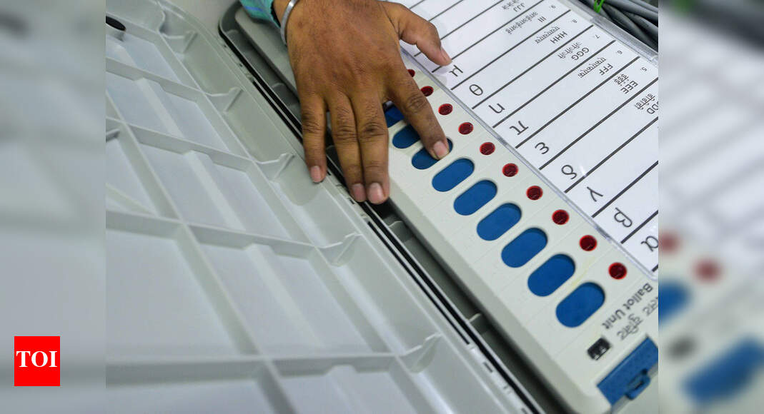 Face masks must, gloves for voters, 5 people for door-to-door campaign: EC issues poll guidelines - Times of India