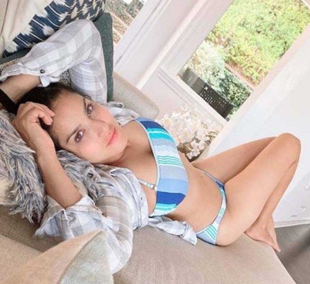 Sunny Leone loves to laze around in a bikini when home photo picture