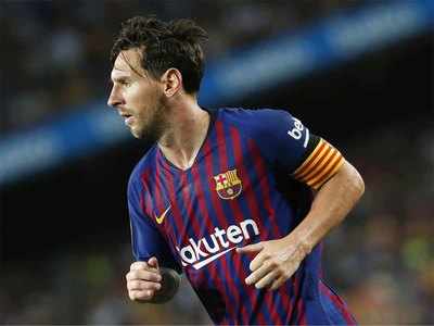 BARCELONA - AUG 15: A fan wearing a Leo Messi shirt at the La Liga match  between