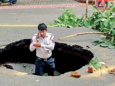 A hole in the centre of Delhi: When a large portion of road caved-in | Delhi  News - Times of India