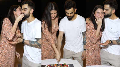 Anushka Sharma's cute baby bump makes an appearance in this adorable floral dress as she and husband Virat Kohli celebrate pregnancy news with RCB team in Dubai