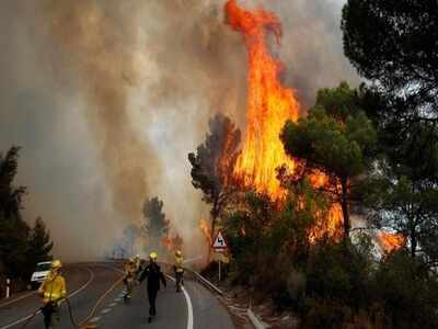 Around 2,400 people have been evacuated due to a wildfire that is out of control and ravaging Spain's southern region of Andalusia, authorities said Sunday. (AP)
