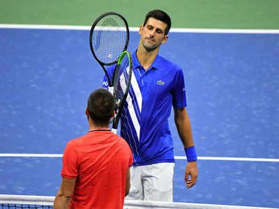 Novak Djokovic marches on at US Open with straight-sets win