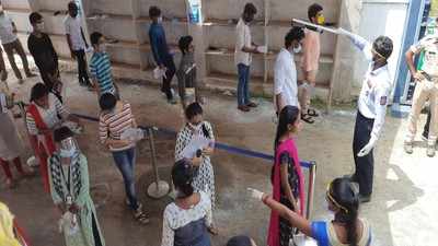 Students line up in front of exam centres for JEE Mains, follow Covid-19 safety norms