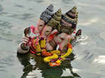 Devotees immerse idols of Lord Ganesha