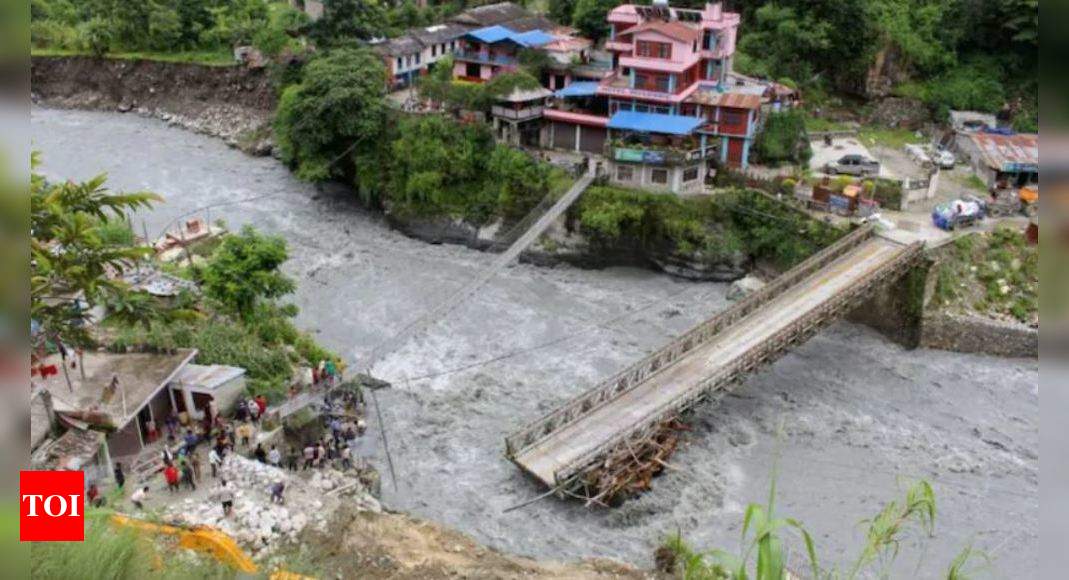 Landslide Flash Floods Kill 12 In Nepal Dozens Missing Times Of India
