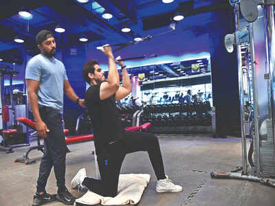 Shiv Panditt works out at a gym in Gurgaon with safety measures