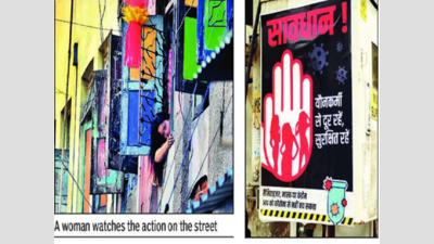 As Kamathipura stirs to life, residents use posters to warn neighbours